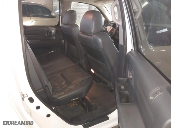 2014 Honda Ridgeline SE with VIN 5FPYK1F6XEB010582, listed as a IAAI auction lot 41641803 with 69,923 mi miles. Bid and sale history available at carsss.com. Image 8.