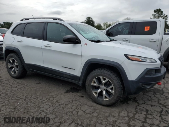 2014 Jeep Cherokee Trailhawk with VIN 1C4PJMBS8EW156633, listed as a Copart auction lot 58197675 with 133,029 mi miles and Clean title. Bid and sale history available at DreamBid. Image 4.