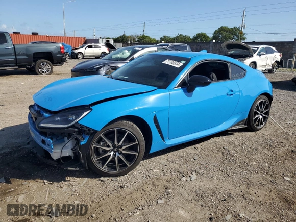2023 Toyota GR86 with VIN JF1ZNBC11P8758861, listed as a Copart auction lot 77705634 with 11,684 mi miles and Salvage Title. Bid and sale history available at carsss.com. Image 1.