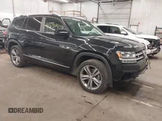 2018 Volkswagen Atlas SEL z VIN 1V2RR2CAXJC548261, wystawiony jako IAAI lot #41650478 z przebiegiem 123 399 mil mil oraz . Historia ofert i sprzedaży dostępna na DreamBid. Obrazek 1.