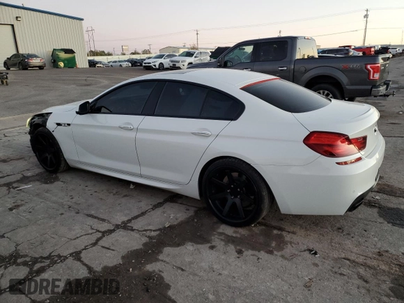 2014 BMW 6 Series 650i z VIN WBA6B2C54ED128858, wystawiony jako Copart lot #79132084 z przebiegiem 29 244 mil mil oraz Szkoda całkowita • Salvage title. Historia ofert i sprzedaży dostępna na DreamBid. Obrazek 2.