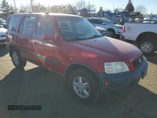 1999 Honda CR-V EX with VIN JHLRD1768XC070126, listed as a Copart auction lot 83966634 with 231,661 mi miles and Salvage Title. Bid and sale history available at carsss.com. Image 4.