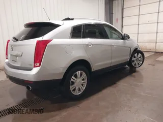 2016 Cadillac SRX Luxury Collection with VIN 3GYFNEE3XGS566210, listed as a IAAI auction lot 42094984 with 99,671 mi miles and . Bid and sale history available at DreamBid. Image 4.