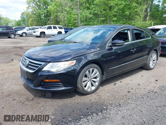 2011 Volkswagen CC Sport with VIN WVWMP7AN8BE709541, listed as a IAAI auction lot 42164892 with 154,547 mi miles. Bid and sale history available at carsss.com. Image 2.