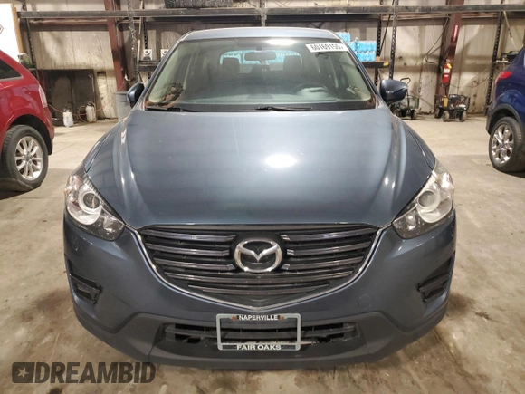 2016 Mazda CX-5 Sport with VIN JM3KE4BY9G0786547, listed as a Copart auction lot 60169155 with 151,599 mi miles and Clean title. Bid and sale history available at DreamBid. Image 5.