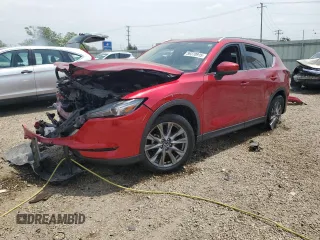 2021 Mazda CX-5 Grand Touring with VIN JM3KFBDM4M0434760, listed as a Copart auction lot 59370915 with 74,695 mi miles and Non repairable. Bid and sale history available at DreamBid. Image 1.