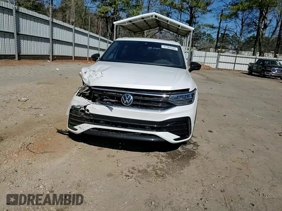 2023 Volkswagen Tiguan SE R-Line Black with VIN 3VVCB7AX6PM001044, listed as a Copart auction lot 47365565 with 20,059 mi miles and Salvage title. Bid and sale history available at DreamBid. Image 14.
