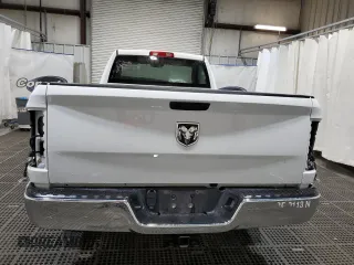 2023 Ram 1500 Tradesman z VIN 3C6JR6DG0PG550543, wystawiony jako Copart lot #60315315 z przebiegiem 5 519 mil mil oraz Szkoda całkowita • Salvage title. Historia ofert i sprzedaży dostępna na DreamBid. Obrazek 6.