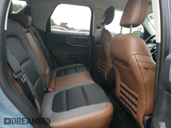 2022 Ford Bronco Sport Outer Banks z VIN 3FMCR9C61NRD00690, wystawiony jako Copart lot #61822235 z przebiegiem 10 635 mil mil oraz Czysty tytuł • Clean title. Historia ofert i sprzedaży dostępna na DreamBid. Obrazek 11.