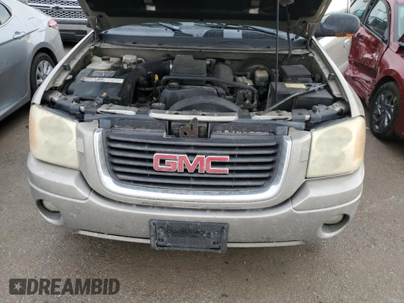 2002 GMC Envoy SLT z VIN 1GKDT13S422468756, wystawiony jako Copart lot #46510595 z przebiegiem 146 924 mil mil oraz Szkoda całkowita • Salvage title. Historia ofert i sprzedaży dostępna na DreamBid. Obrazek 13.