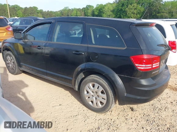 2014 Dodge Journey SE with VIN 3C4PDCAB7ET170340, listed as a IAAI auction lot 42078834 with 215,084 mi miles and . Bid and sale history available at carsss.com. Image 3.