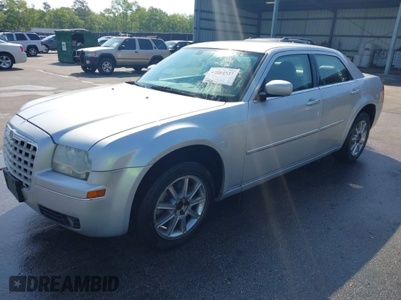 2008 Chrysler 300 Touring with VIN 2C3LK53G38H233492, listed as a IAAI auction lot 42004537 with 200,695 mi miles and . Bid and sale history available at carsss.com. Image 2.
