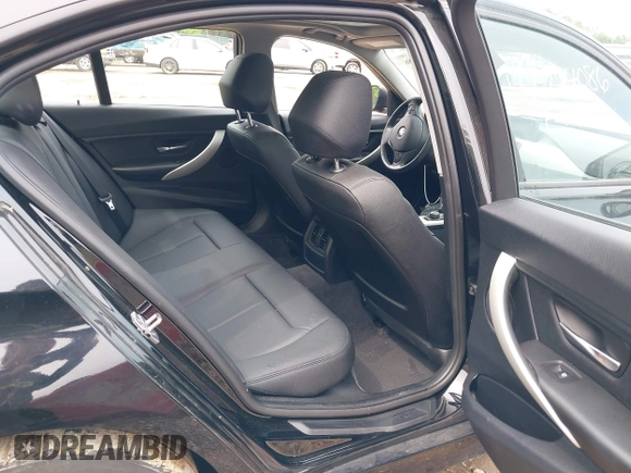 2014 BMW 3 Series 320i with VIN WBA3B1C52EK135610, listed as a IAAI auction lot 42274086 with 69,536 mi miles and . Bid and sale history available at DreamBid. Image 8.
