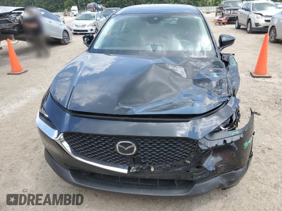 2023 Mazda CX-30 S with VIN 3MVDMBAM6PM513651, listed as a Copart auction lot 57432955 with 49,851 mi miles and Salvage title. Bid and sale history available at DreamBid. Image 5.