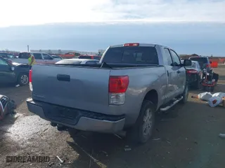 2012 Toyota Tundra 2WD Truck with VIN 5TFRM5F14CX037380, listed as a IAAI auction lot 41683381 with 218,413 mi miles. Bid and sale history available at carsss.com. Image 4.