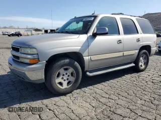 2005 Chevrolet Tahoe Z71 z VIN 1GNEC13T15R116181, wystawiony jako Copart lot #56891975 z przebiegiem 220 849 mil mil oraz Czysty tytuł • Clean title. Historia ofert i sprzedaży dostępna na DreamBid. Obrazek 1.