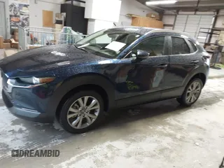 2022 Mazda CX-30 S Select z VIN 3MVDMBBL0NM440747, wystawiony jako IAAI lot #41864038 z przebiegiem 9667 mil mil oraz . Historia ofert i sprzedaży dostępna na DreamBid. Obrazek 14.
