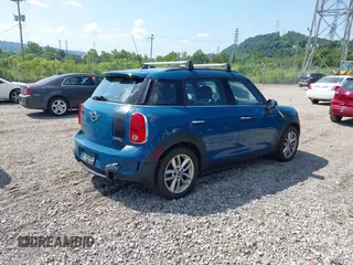 2011 MINI Countryman S with VIN WMWZC5C57BWM11279, listed as a IAAI auction lot 42649621 with 100,000 mi miles and . Bid and sale history available at DreamBid. Image 4.