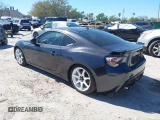 2013 Subaru BRZ Limited with VIN JF1ZCAC18D1602613, listed as a IAAI auction lot 41756384 with 136,519 mi miles. Bid and sale history available at carsss.com. Image 3.