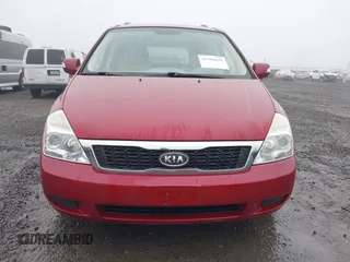 2011 Kia Sedona LX with VIN KNDMG4C71B6411453, listed as a IAAI auction lot 41316825 with 261,028 mi miles. Bid and sale history available at carsss.com. Image 13.