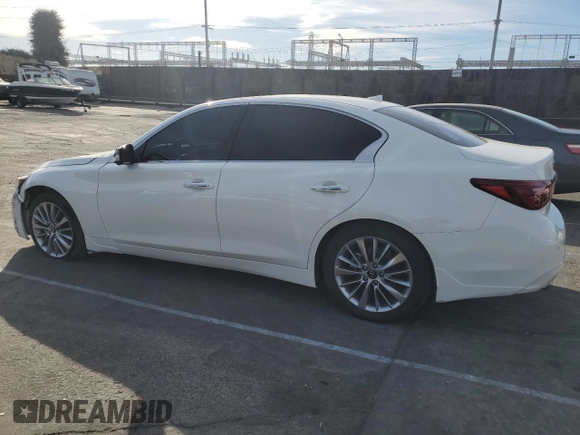 2023 Infiniti Q50 Luxe with VIN JN1EV7BP8PM511178, listed as a Copart auction lot 42441725 with 26,861 mi miles and Salvage Title. Bid and sale history available at DreamBid. Image 2.