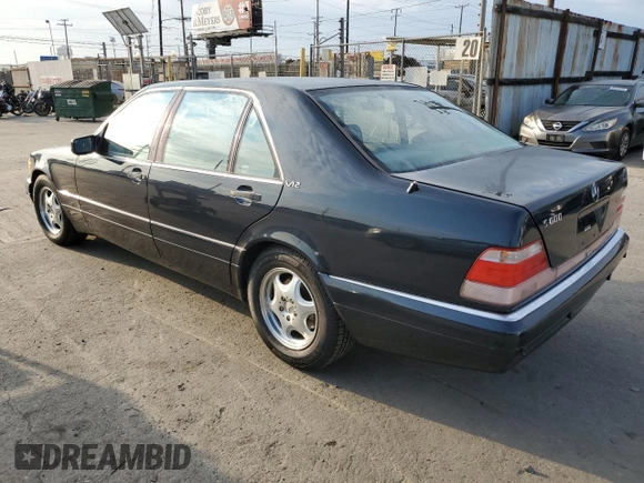 1999 Mercedes-Benz S with VIN WDBGA57G5XA428158, listed as a Copart auction lot 65543515 with 65,698 mi miles and Salvage title. Bid and sale history available at DreamBid. Image 2.