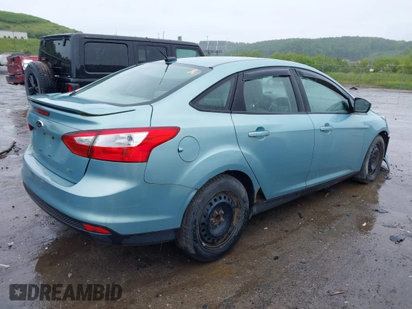 2012 Ford Focus SE with VIN 1FAHP3F21CL226033, listed as a IAAI auction lot 42368786 with 168,061 mi miles and . Bid and sale history available at DreamBid. Image 4.