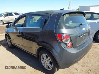 2014 Chevrolet Sonic LT with VIN 1G1JC6SH1E4111523, listed as a IAAI auction lot 41693815 with 147,353 mi miles. Bid and sale history available at carsss.com. Image 3.