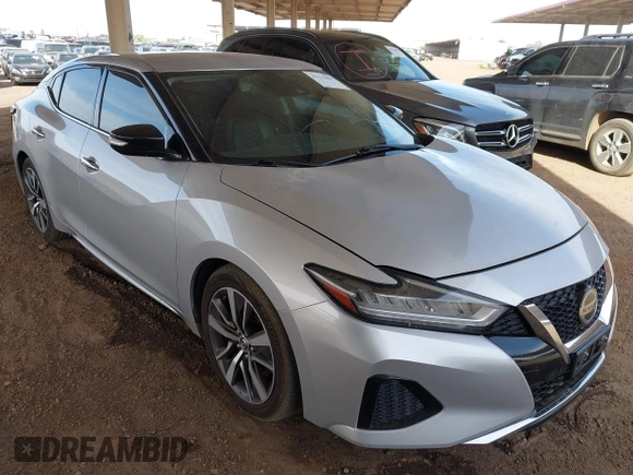 2020 Nissan Maxima SV z VIN 1N4AA6CV8LC361190, wystawiony jako IAAI lot #42225461 z przebiegiem 102 879 mil mil oraz . Historia ofert i sprzedaży dostępna na DreamBid. Obrazek 1.