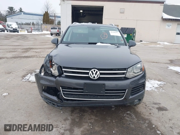 2012 Volkswagen Touareg Sport z VIN WVGEF9BP4CD008517, wystawiony jako IAAI lot #41386971 z przebiegiem 179 306 mil mil oraz . Historia ofert i sprzedaży dostępna na DreamBid. Obrazek 12.