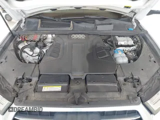2017 Audi Q7 Premium with VIN WA1AAAF74HD006104, listed as a IAAI auction lot 42554741 with 95,276 mi miles and . Bid and sale history available at DreamBid. Image 10.