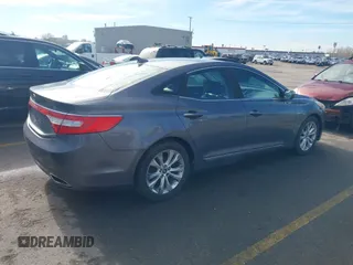 2012 Hyundai Azera with VIN KMHFG4JG9CA149848, listed as a IAAI auction lot 41658387 with 164,933 mi miles and . Bid and sale history available at carsss.com. Image 4.