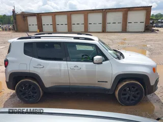 2017 Jeep Renegade Latitude z VIN ZACCJBBB2HPF61293, wystawiony jako IAAI lot #42004209 z przebiegiem 101 214 mil mil oraz . Historia ofert i sprzedaży dostępna na DreamBid. Obrazek 13.