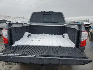 2018 Nissan Titan Pro-4X z VIN 1N6AA1E51JN536680, wystawiony jako Copart lot #82361724 z przebiegiem 98 699 mil mil oraz Szkoda całkowita • Salvage title. Historia ofert i sprzedaży dostępna na DreamBid. Obrazek 6.