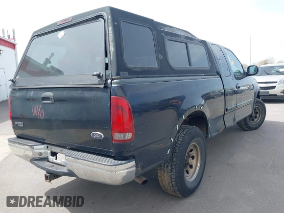 1999 Ford F-150 XL with VIN 1FTRX18L8XNB25526, listed as a IAAI auction lot 41970764 with 1 mi miles. Bid and sale history available at carsss.com. Image 4.