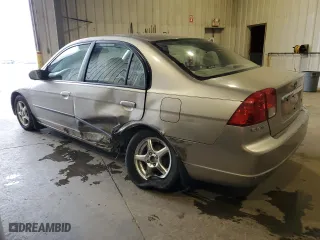2003 Honda Civic DX with VIN 2HGES16483H927393, listed as a Copart auction lot 79415054 with 218,297 mi miles and Salvage Title. Bid and sale history available at carsss.com. Image 2.
