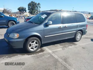 2002 Kia Sedona LX with VIN KNDUP131826297204, listed as a IAAI auction lot 41510393 with 136,337 mi miles. Bid and sale history available at carsss.com. Image 2.