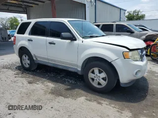 2011 Ford Escape XLS with VIN 1FMCU9C74BKC30951, listed as a Copart auction lot 57912165 with 159,079 mi miles and Salvage title. Bid and sale history available at DreamBid. Image 4.