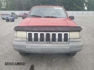1998 Jeep Grand Cherokee Laredo with VIN 1J4FX58S3WC144684, listed as a Copart auction lot 67226694 with 106,602 mi miles and Clean Title. Bid and sale history available at carsss.com. Image 5.