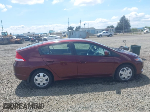 2011 Honda Insight LX z VIN JHMZE2H51BS004312, wystawiony jako IAAI lot #42086422 z przebiegiem 72 814 mil mil oraz . Historia ofert i sprzedaży dostępna na DreamBid. Obrazek 13.