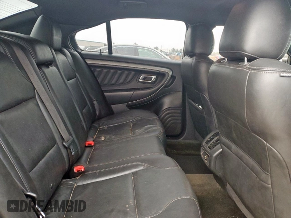 2014 Ford Taurus SEL z VIN 1FAHP2E84EG133955, wystawiony jako Copart lot #56630155 z przebiegiem 113 045 mil mil oraz Szkoda całkowita • Salvage title. Historia ofert i sprzedaży dostępna na DreamBid. Obrazek 10.