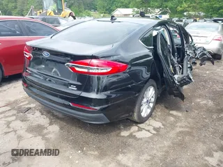 2020 Ford Fusion SE with VIN 3FA6P0LU9LR234832, listed as a IAAI auction lot 42092141 with 54,866 mi miles and . Bid and sale history available at carsss.com. Image 4.