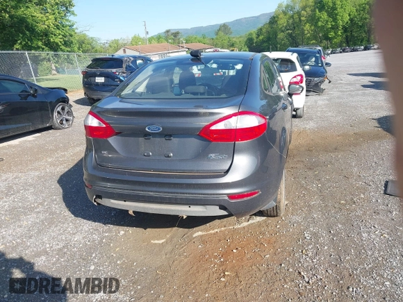 2016 Ford Fiesta SE z VIN 3FADP4BJ8GM184675, wystawiony jako IAAI lot #42169234 z przebiegiem 54 231 mil mil oraz . Historia ofert i sprzedaży dostępna na DreamBid. Obrazek 17.