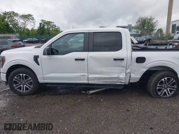 2023 Ford F-150 XL with VIN 1FTEW1EP5PFB87582, listed as a IAAI auction lot 42254015 with 10,476 mi miles and . Bid and sale history available at DreamBid. Image 14.