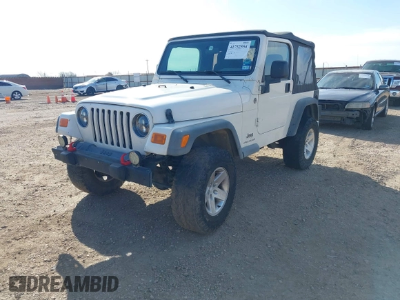 2005 Jeep Wrangler Sport with VIN 1J4FA49SX5P336380, listed as a IAAI auction lot 41752554 with 139,004 mi miles. Bid and sale history available at carsss.com. Image 2.