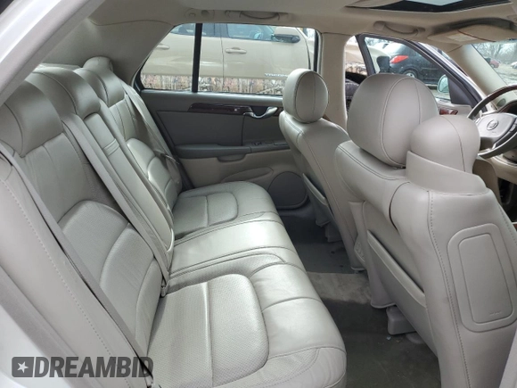 2003 Cadillac DeVille DTS z VIN 1G6KF57993U201484, wystawiony jako Copart lot #43742375 z przebiegiem 53 478 mil mil oraz Szkody całkowita. Historia ofert i sprzedaży dostępna na DreamBid. Obrazek 11.