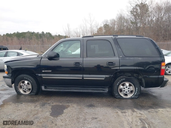 2003 Chevrolet Tahoe LS with VIN 1GNEC13Z73R243308, listed as a IAAI auction lot 41510266 with 246,378 mi miles. Bid and sale history available at carsss.com. Image 14.