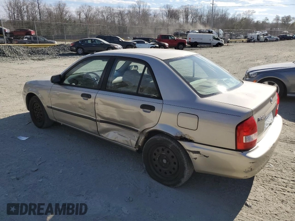 2002 Mazda Protege DX with VIN JM1BJ225520525472, listed as a Copart auction lot 45699915 with 183,457 mi miles and Salvage Title. Bid and sale history available at DreamBid. Image 2.