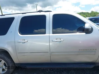 2012 Chevrolet Suburban LT z VIN 1GNSCJE01CR143982, wystawiony jako IAAI lot #42257552 z przebiegiem 202 973 mil mil oraz . Historia ofert i sprzedaży dostępna na DreamBid. Obrazek 13.