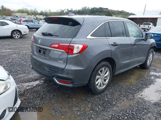 2018 Acura RDX Technology with VIN 5J8TB4H51JL010679, listed as a IAAI auction lot 41973440 with 97,643 mi miles and . Bid and sale history available at carsss.com. Image 4.